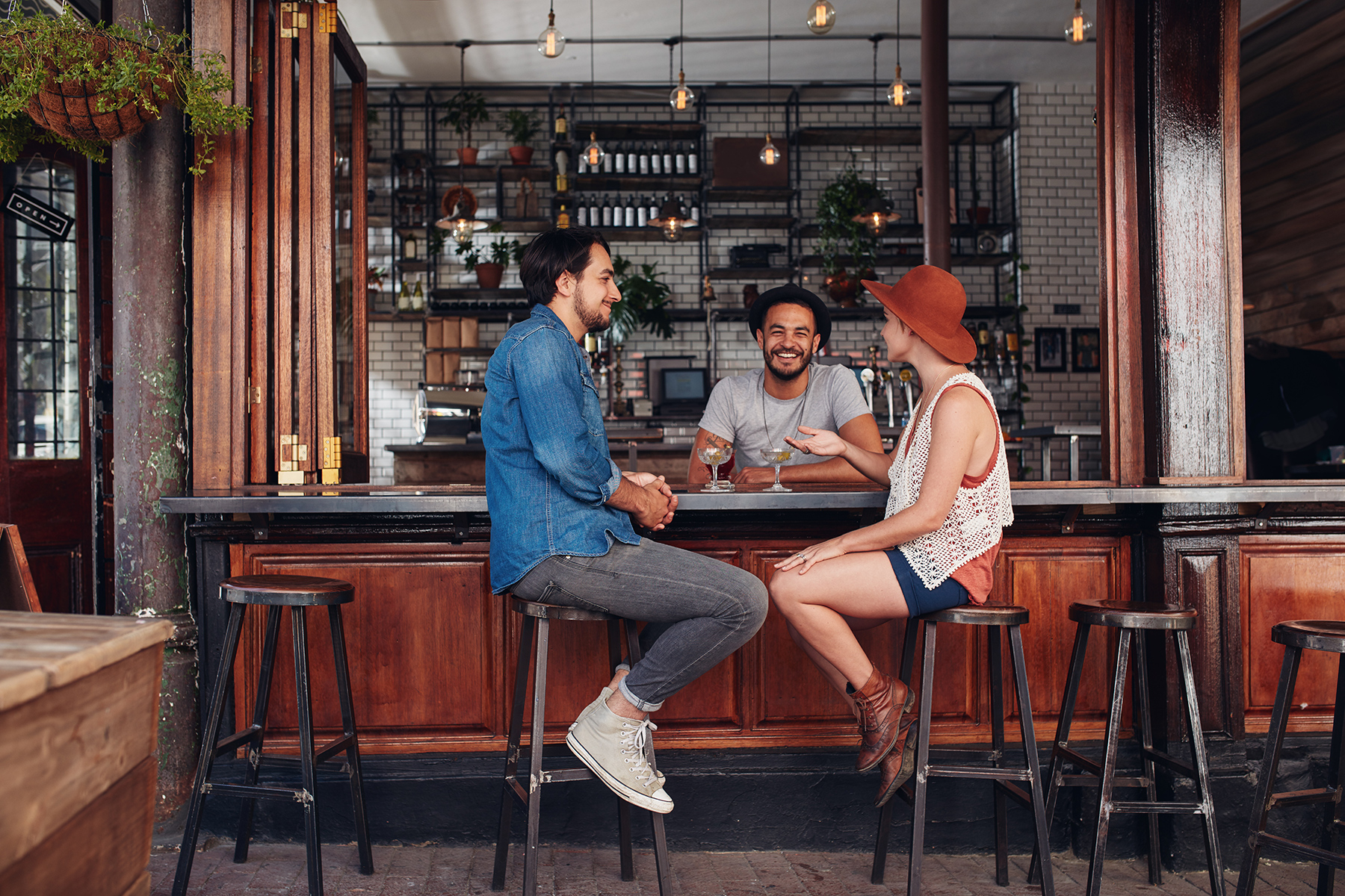 friends enjoying drinks at a bar