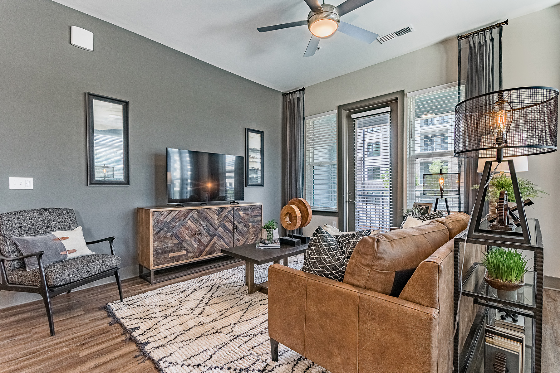 Open living room with large windows and patio door