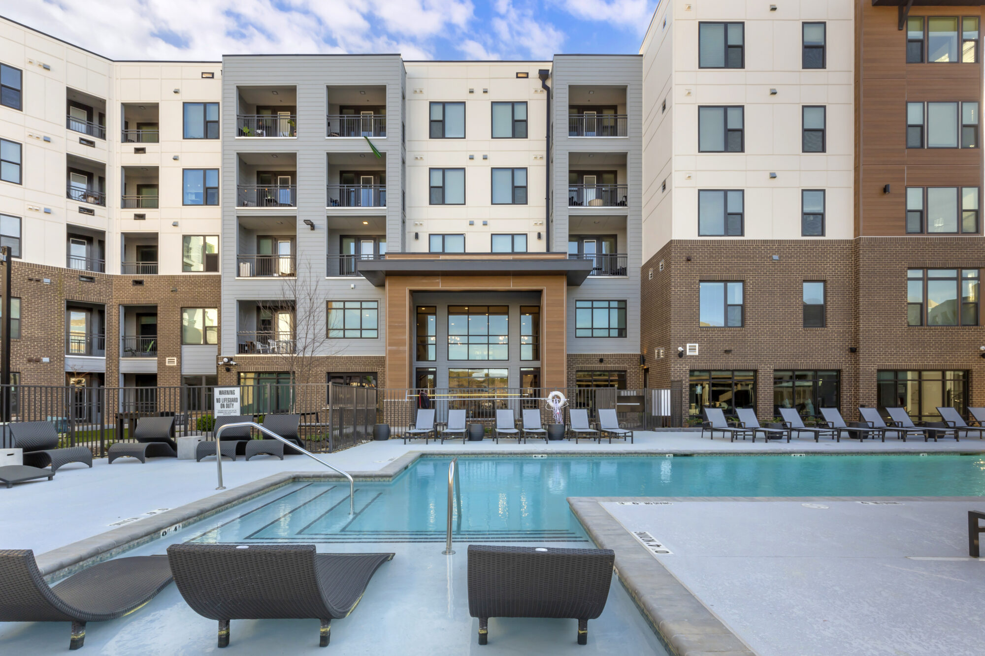 Pool courtyard with deck chairs